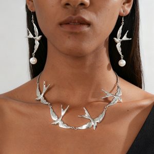 European and American style cool personality metal sense swallow pendant sweater chain simple graceful unique niche high sense necklace